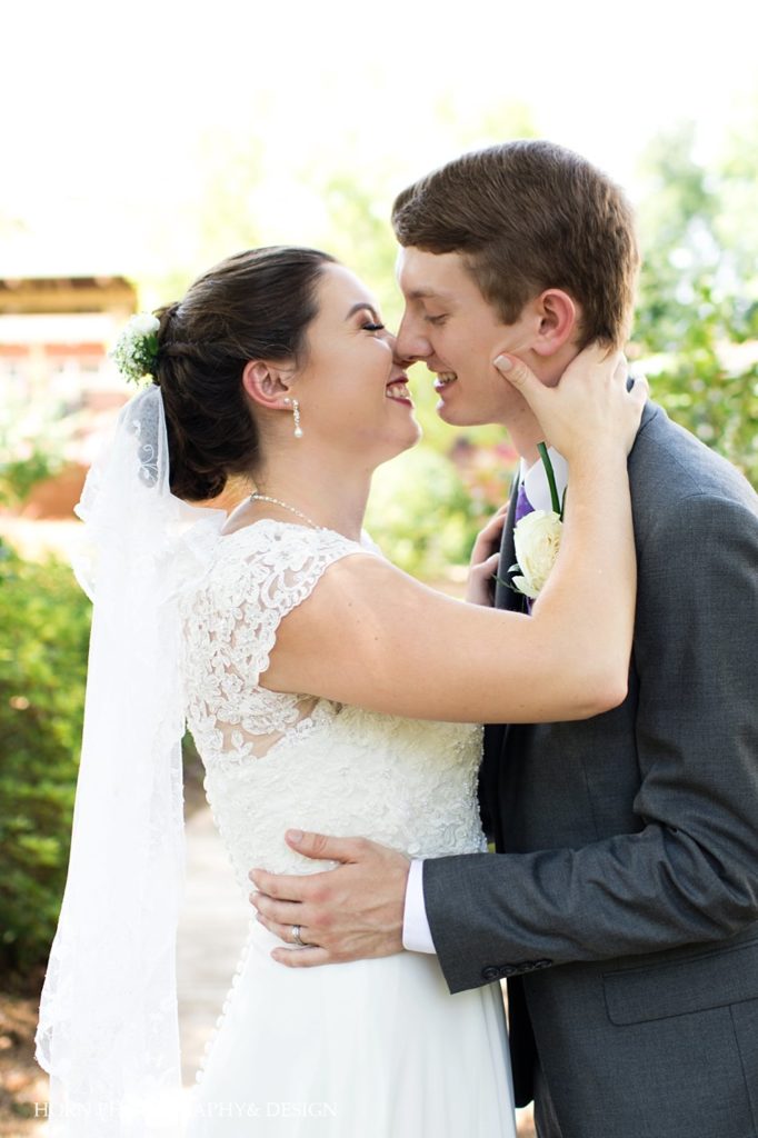 bride and groom kissing outdoor photo session wedding day Metro Atlanta horn photography and design