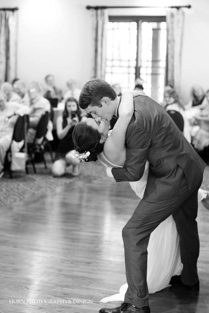 black and white first dance husband and wife dip and kiss perfect wedding photo horn photography and design