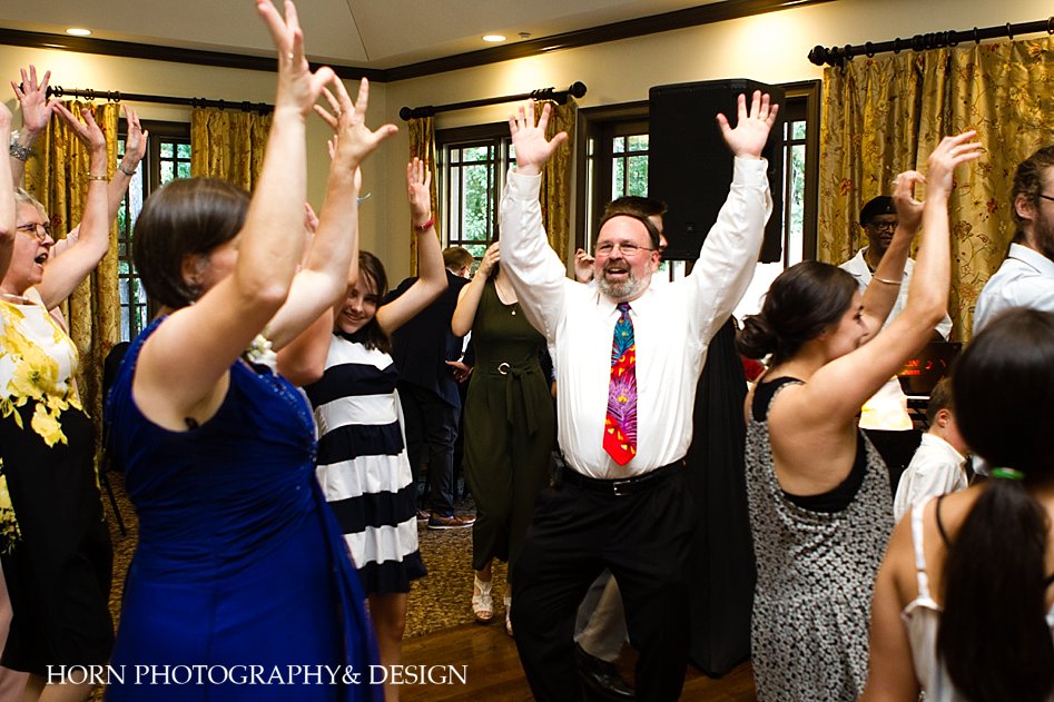 SHOUT wedding reception dance tradition horn photography and design