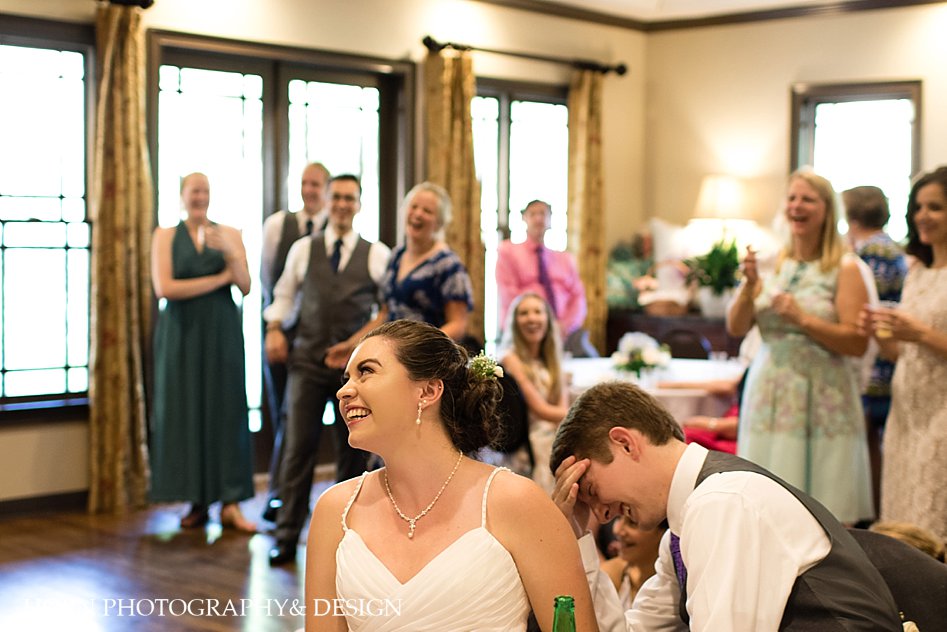 bride and groom reception wedding toast reaction 7d Mark II camera horn photography and design