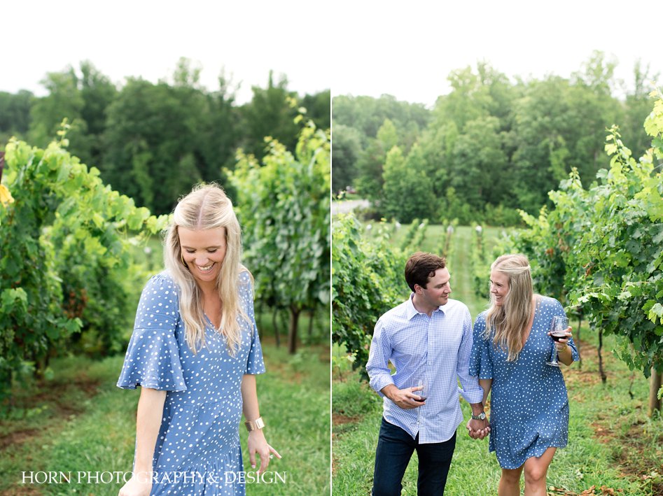 happy engaged couple walking hand in hand through mountain vineyard The Cottage Vineyard Cleveland GA horn photography and design
