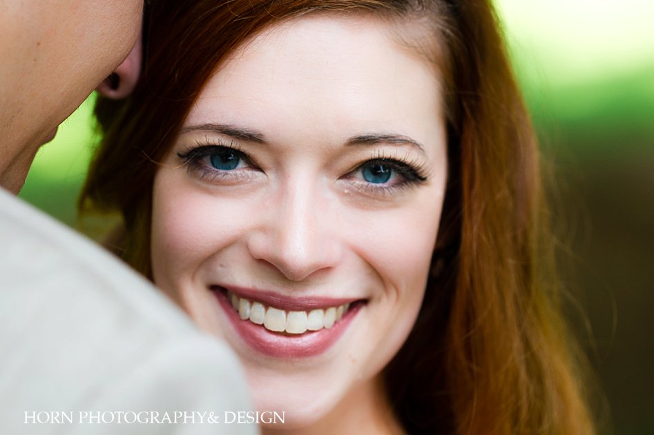 portrait up close red hair aqua color eyes natural makeup for fair skin tone horn photography and design