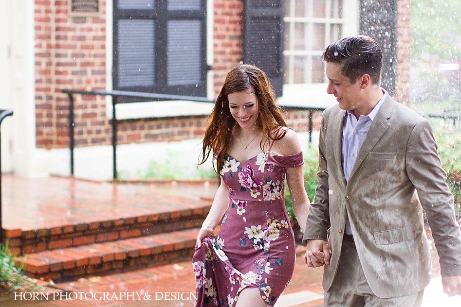 a picture is worth a thousand words photos in the rain couples engagement horn photography and design