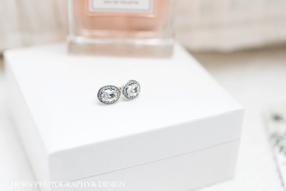 diamond earrings horn photography and design wedding photographers 