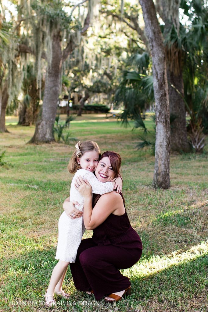 mother daughter hug in park in Florida 