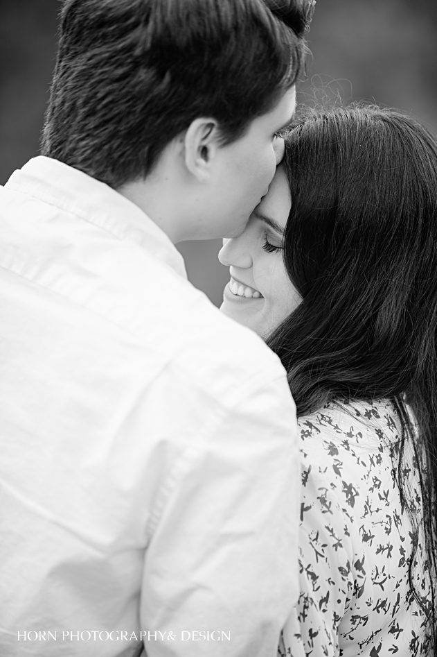 black and white guy kisses girl on forehead horn photography and design Dahlonega ga atl wedding photographers
