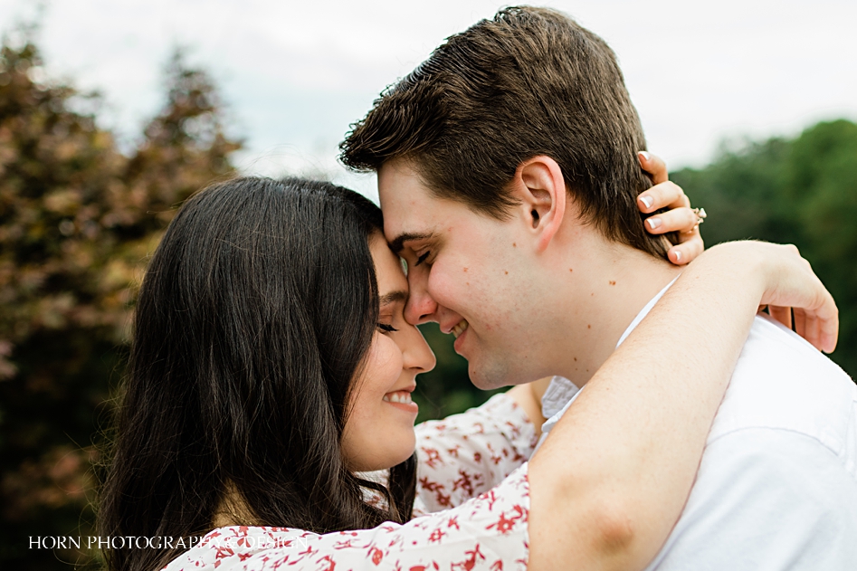 how to pose an engaged couple blue mountain events engagement ring horn photography and design Dahlonega ga atl wedding photographers