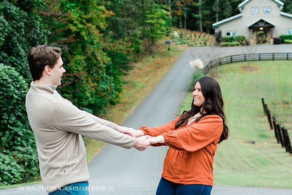 dancing couple in the fall horn photography and design Dahlonega Georgia blue mountain engagement fall
