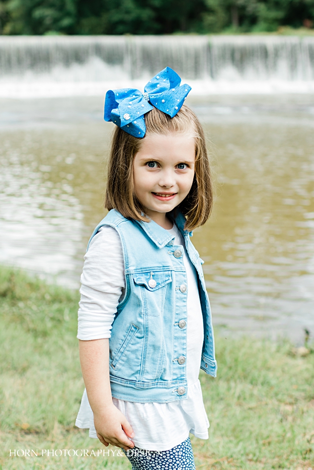 daughter with blue polka dot bow