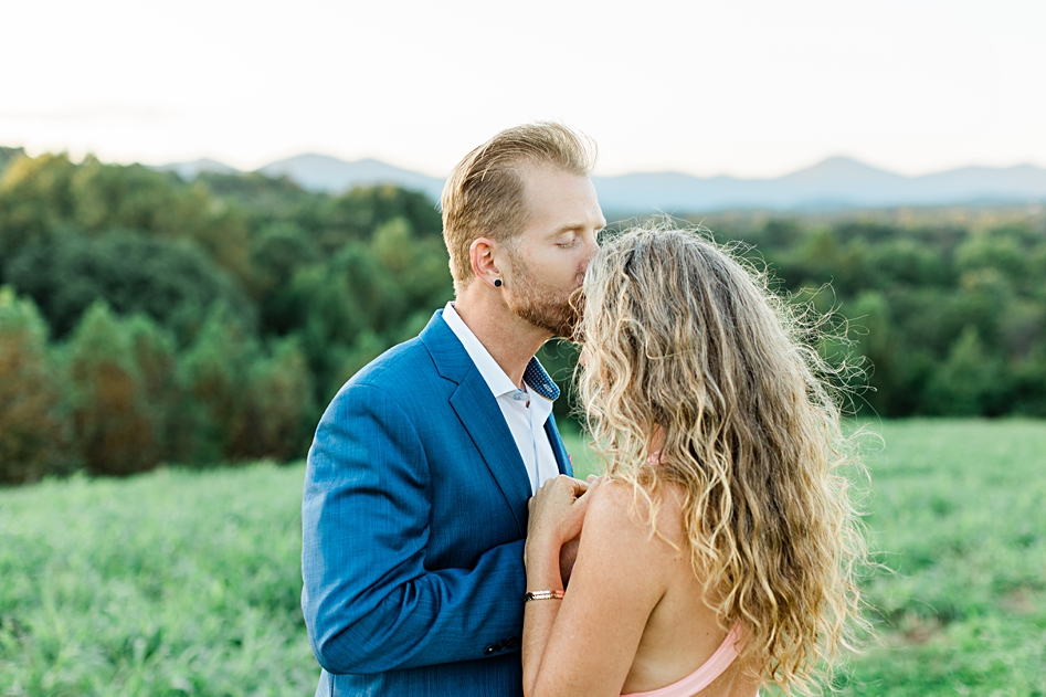 husband wife anniversary photography shoot horn photography and design kissing forehead