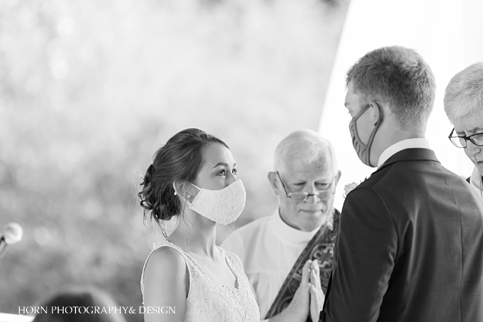 bride wearing covid mask pandemic wedding