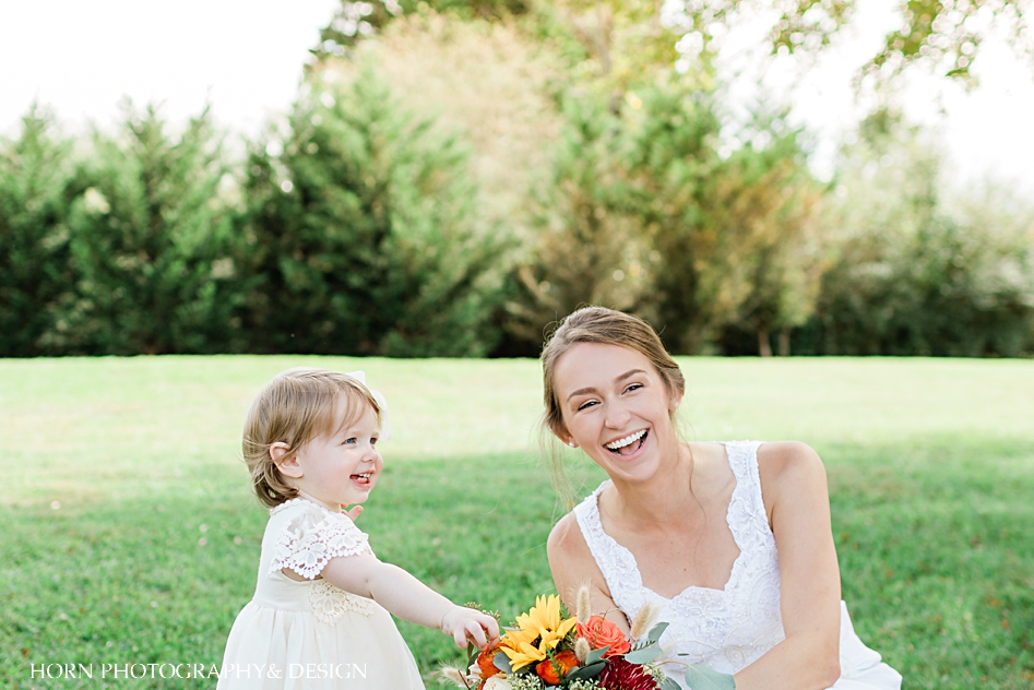 bride with flower girl