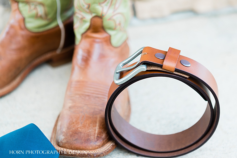 country wedding Monroe GA cowboy boots leather belt Horn photography and design St. Anna Church wedding