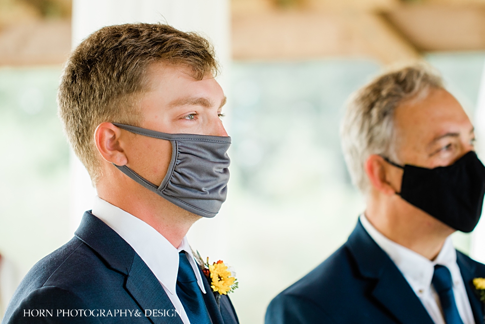 pandemic wedding groom wearing mask covid