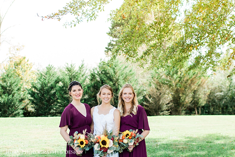 wine colored bridesmaid's dresses fall bouquets