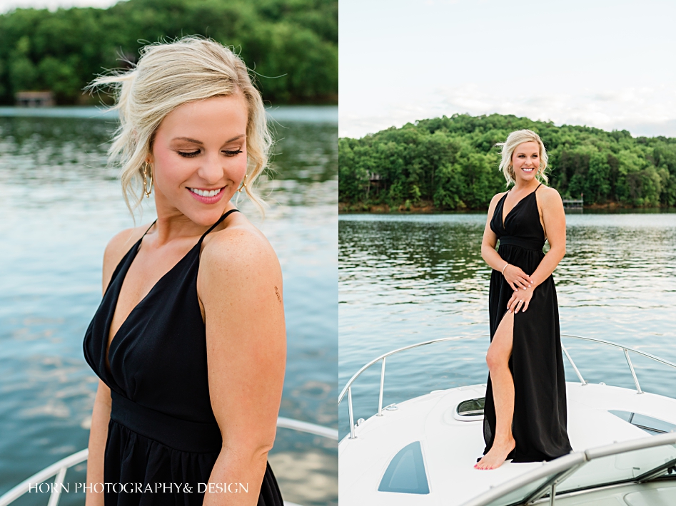 Black dress on a cabin cruiser boat lake Lanier nautical engagement shoot horn photography and design
