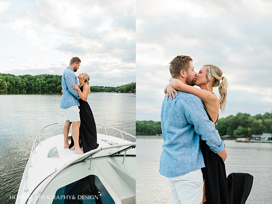 bride and groom on deck of boat Black dress on a cabin cruiser boat lake Lanier nautical engagement shoot horn photography and design