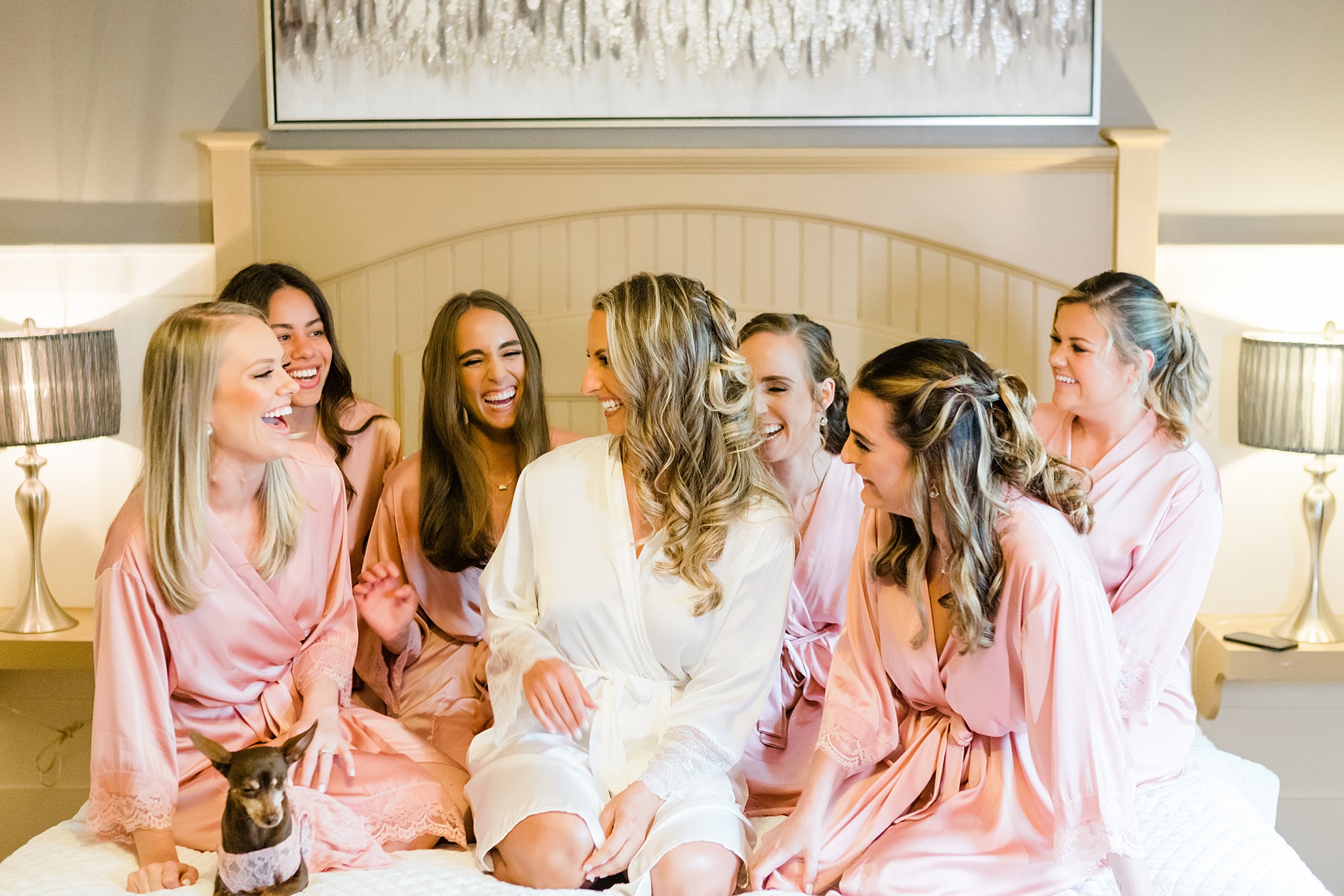 Pack some prep attire Bride sitting on bed with bridesmaids dahlonega wedding photographer weekly Wednesday wedding tip